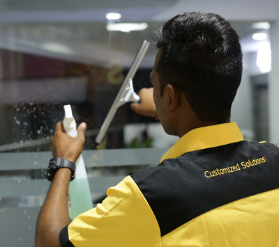 Picture of man cleaning the building